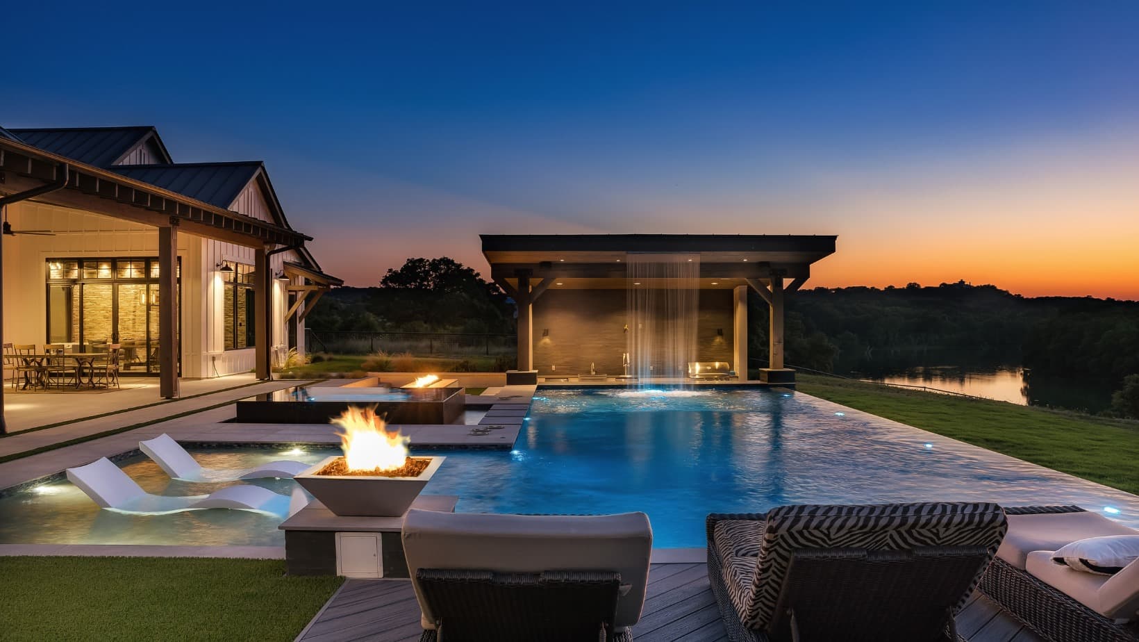 Crystal blue pool with modern tile finishes